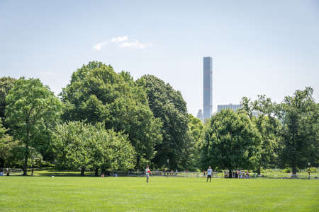 NEW YORK CITY - JULY 10: People have rest in Central Park on July 10, 2015 in New York. Central Park is an urban park in the central part of the borough of Manhattan.のeditorial素材