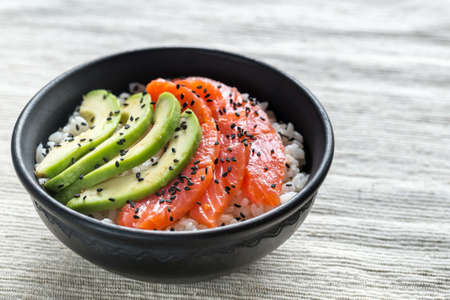 Rice with salmon and avocadoの写真素材