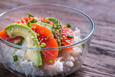 Rice with salmon and avocadoの写真素材