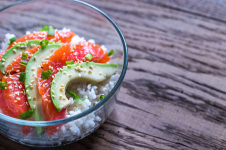 Rice with salmon and avocadoの写真素材