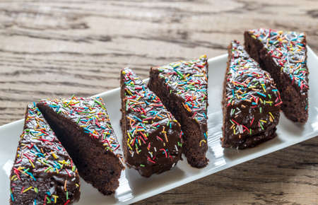 Pieces of fudge cake on the plateの写真素材