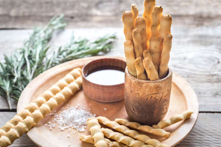 Rosemary breadsticks with ingredientsの写真素材