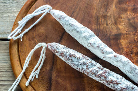 Spanish fuet on the wooden boardの写真素材