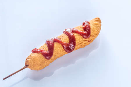 Corn dog on the white backgroundの写真素材