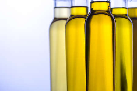 Bottles with different kinds of vegetable oilの写真素材