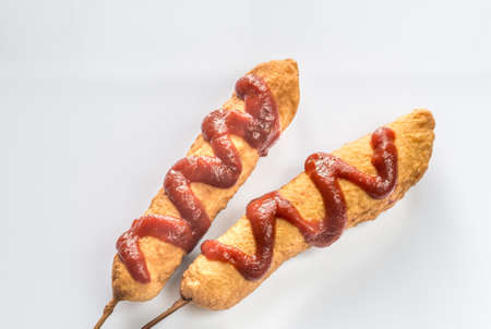 Corn dogs on the white backgroundの写真素材