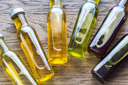 Bottles with different kinds of vegetable oilの写真素材