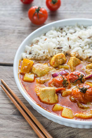 Thai yellow curry with chicken and riceの写真素材