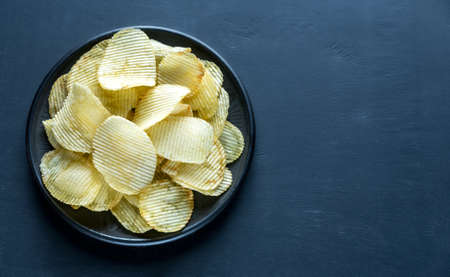 Potato chips in the bowlの写真素材