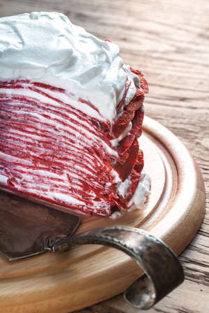 Red velvet crepe cake on the wooden board