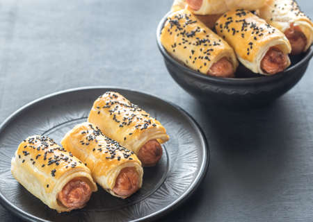 Portion of sausage rollsの写真素材