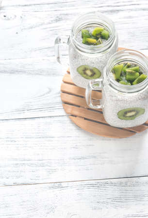 Chia seed puddings with kiwifruit slicesの写真素材