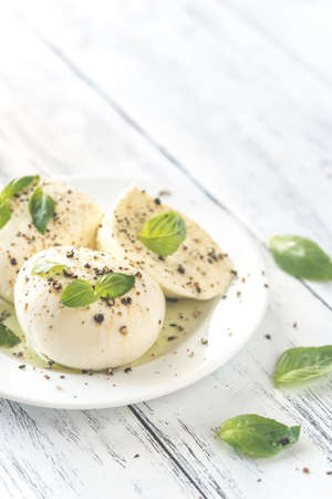 Mozzarella with fresh basil leavesの写真素材