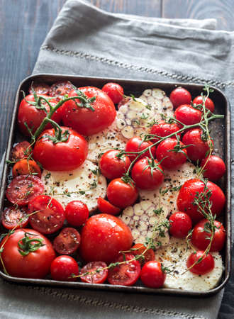 Baked feta with tomatoes and garlicの写真素材