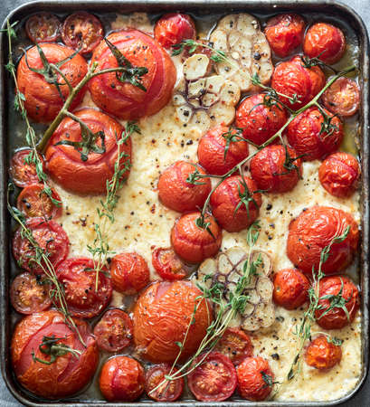 Baked feta with tomatoes and garlicの写真素材