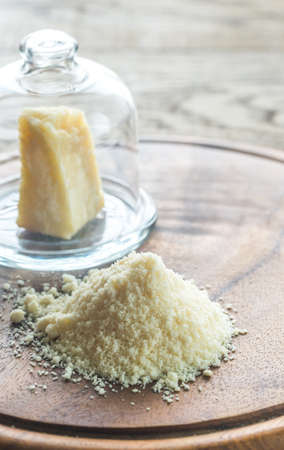 Parmesan cheese on the wooden boardの写真素材