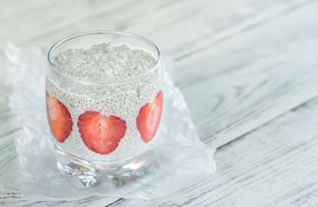 Chia seed puddings with strawberry slicesの写真素材