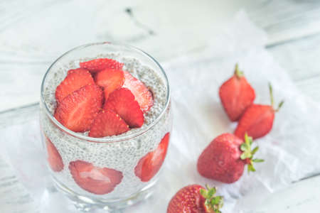 Chia seed puddings with strawberry slicesの写真素材