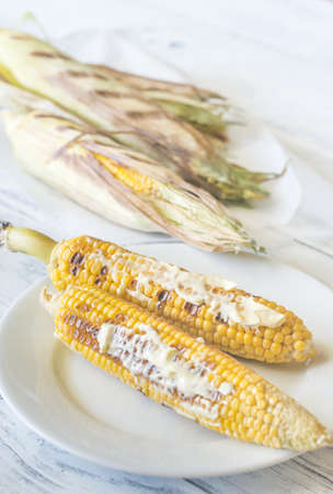 Grilled corncorbs on the plate