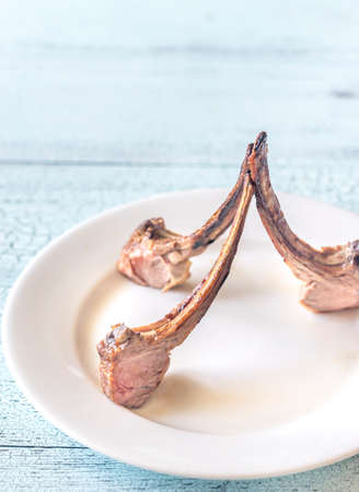 Grilled lamb rib chops on the plateの写真素材