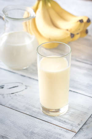Glass of banana milk shakeの写真素材