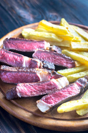Beef steak with fried potatoes