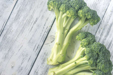 Broccoli on the wooden tableの写真素材