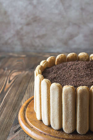 Tiramisu cake on the wooden board