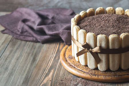 Tiramisu cake on the wooden board