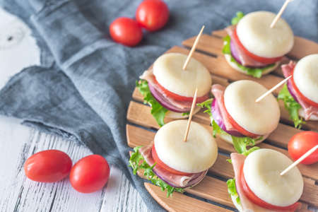 Mini cheese and prosciutto sandwichesの写真素材