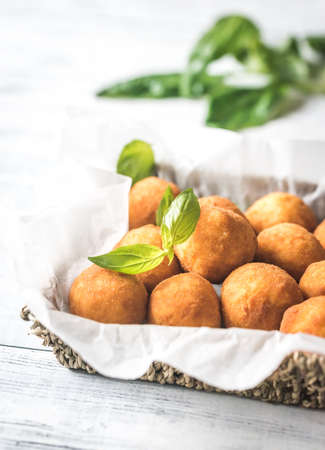 Rustic bowl of arancini
