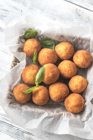 Rustic bowl of arancini