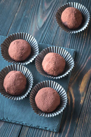 Rum balls on the black stone board