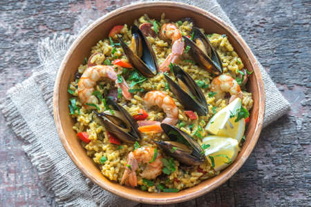 Bowl of seafood paellaの写真素材