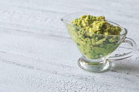 Guacamole in glass gravy-boatの写真素材