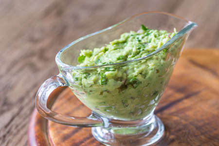 Guacamole in glass gravy-boatの写真素材