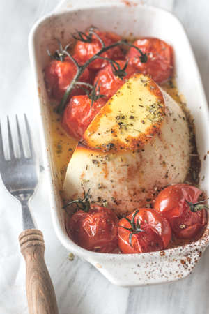 Baked ricotta with cherry tomatoes