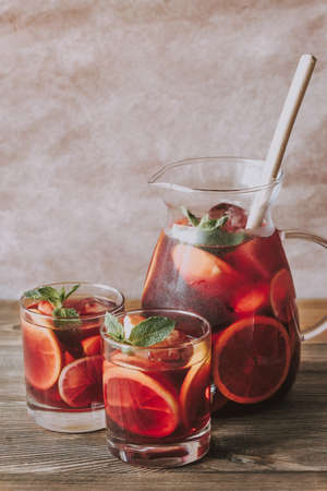 A pitcher and two glasses with Spanish fruit Sangriaの写真素材