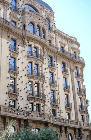 BARCELONA, SPAIN - JULY 17, 2018: Facade of the Ohla Hotel Barcelona decorated with work "Globus Oculars"のeditorial素材
