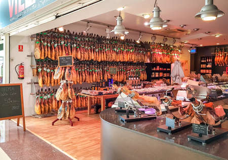 SANTA SUSANNA, SPAIN - JULY 21, 2018: Variety of Spanish jamon at the shop in Santa Susanna,...