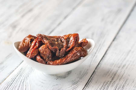 Bowl of sun-dried tomatoesの写真素材