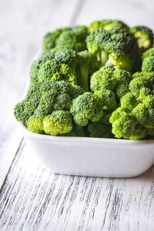 Fresh broccoli on the white bowlの写真素材
