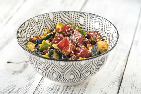 Bowl of poke - traditional Hawaiian dish