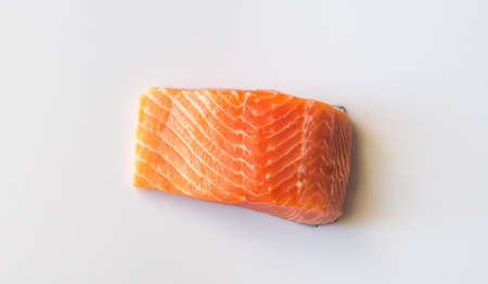 Raw salmon on the white background