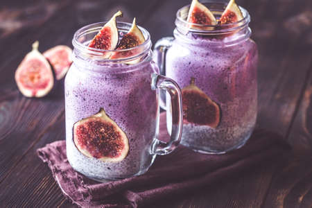 Chia seed puddings with fig slicesの写真素材