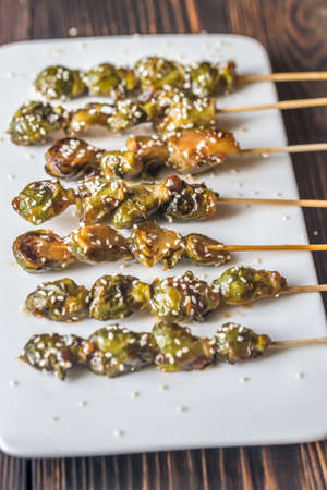 Brussels sprouts skewers with teriyaki sauceの写真素材