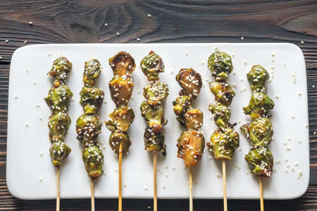 Brussels sprouts skewers with teriyaki sauceの写真素材