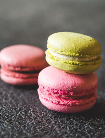Colorful macarons on the dark backgroundの写真素材