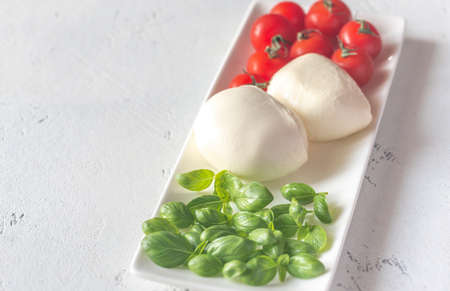 Mozzarella, tomatoes and basil
