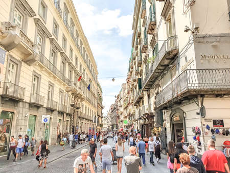 NAPLES, ITALY- JULY 16: People walking street in Naples